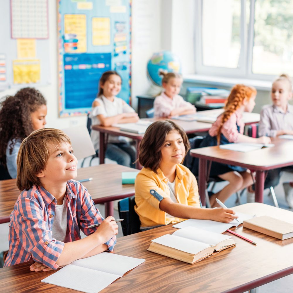 concentrated-little-kids-listening-teacher-in-clas-2022-12-16-17-09-37-utc
