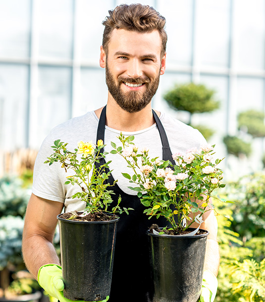 gardener with flower pot
